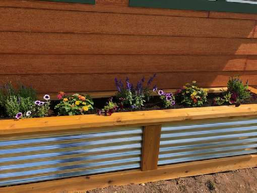 Reliable Repair Michigan handyman service Marquette northern builder flower box